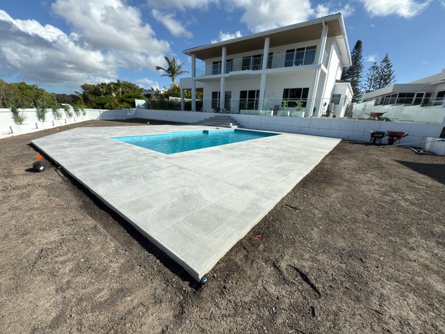 Pool installation with water feature