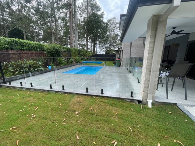 Pool with concrete coping installation